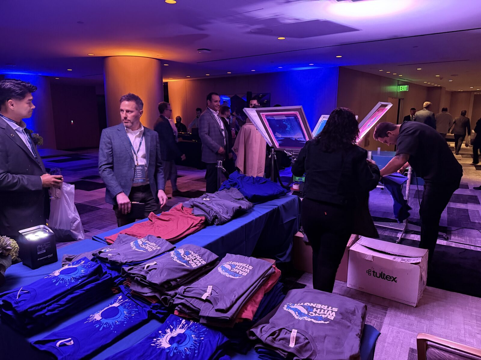 Merch Troop live printing — presses rolling at the event
